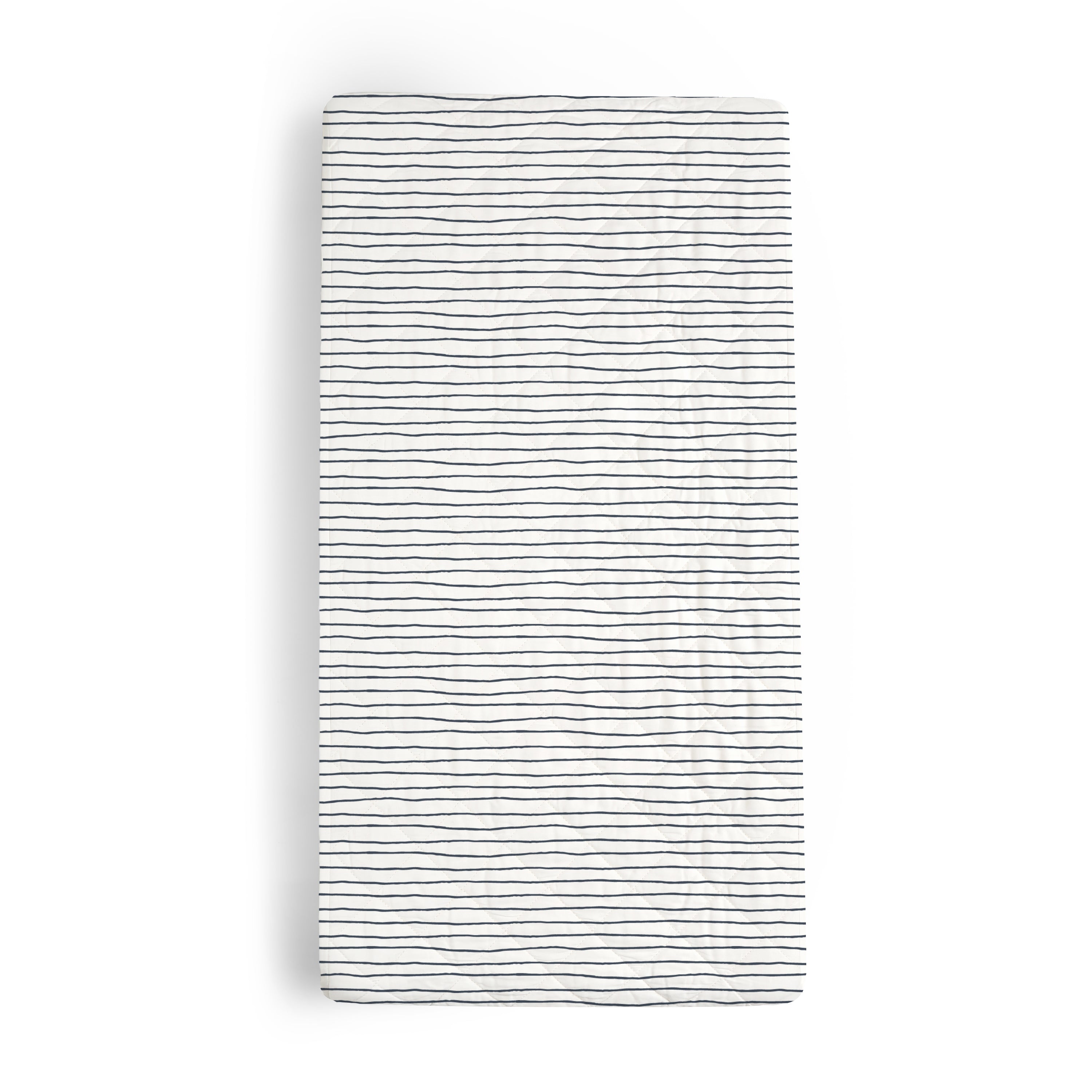 White folded towel with black horizontal stripes on a plain background. 
Product Name: Makemake Organics Organic Cotton Changing Pad Cover - Navy Stripes