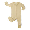 A pale yellow Organic 2-Way Zip Romper - Yellowstone with tiny white polka dots, featuring a full-length zipper and enclosed feet, arranged flat on a white background by Organic Baby.