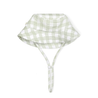 A green and white gingham patterned kitchen cloth with a fabric loop, neatly folded into a triangle shape and isolated on a white background, perfect for cleaning up after a baby.