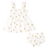 Organic Smocked Dress - Sunshine by Makemake Organics and matching bloomers with golden polka dots and ruffled sleeves isolated on a white background.