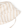 An Organic Linen Bucket Sun Hat - Beige Stripes from Makemake Organics with a wide brim and a thin tie, photographed on a white background.