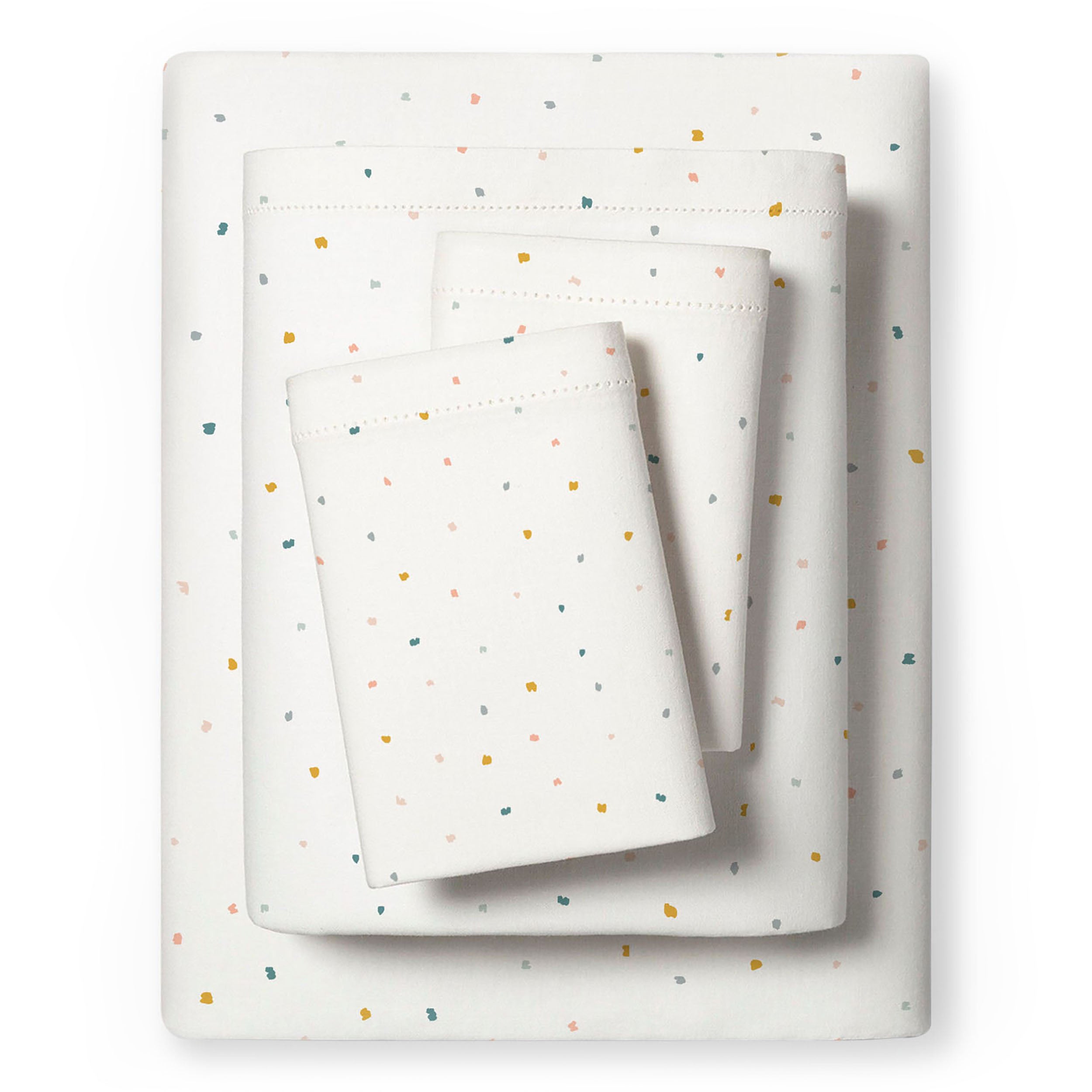 A neatly folded Makemake Organics Organic Cotton Sheet Set - Dotty with a white base and multicolored polka dots pattern, including a fitted sheet, flat sheet, and pillowcase.