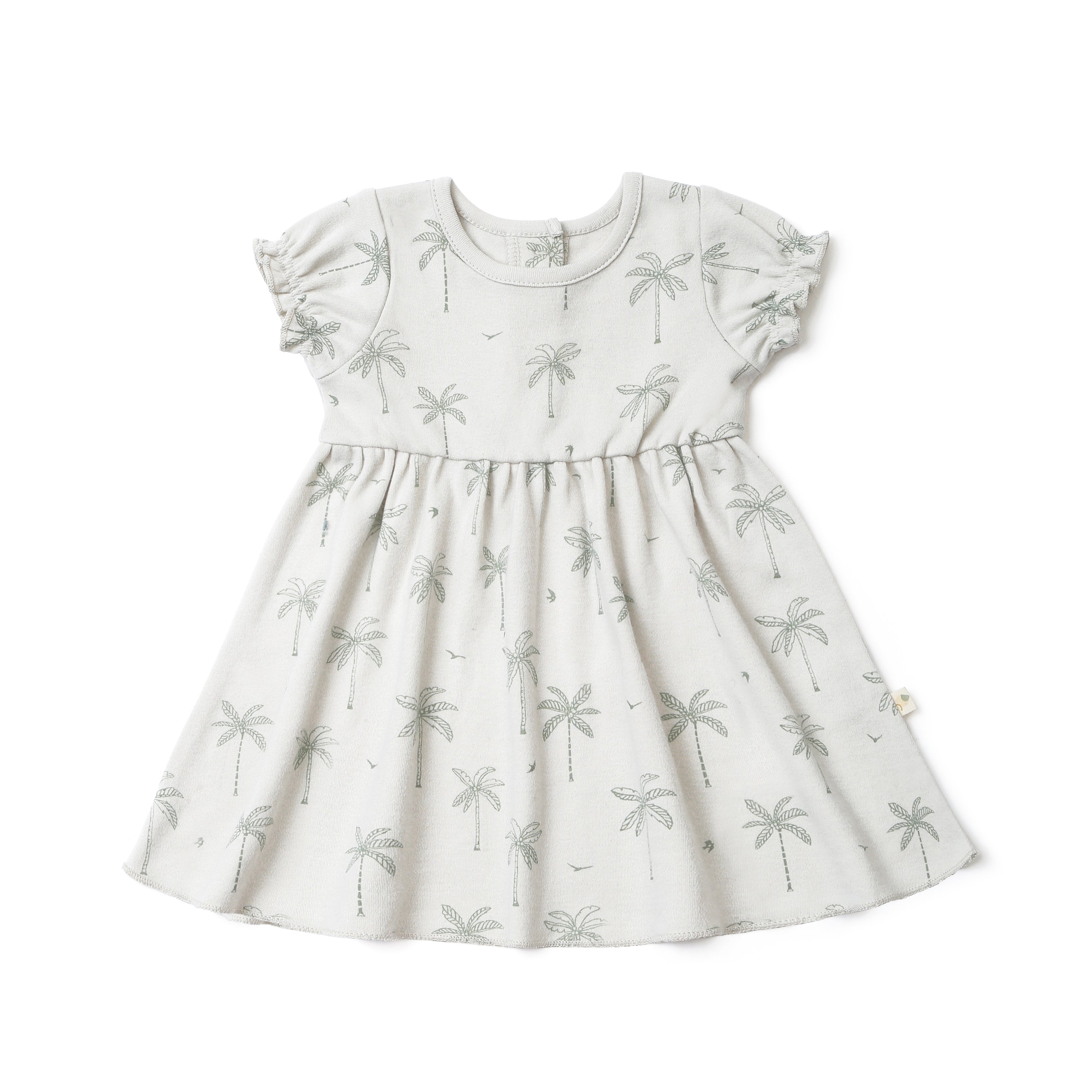 A toddler's Organic Puff Sleeve Dress - Tropical from Organic Kids with a flared skirt featuring a subtle palm tree print, short puff sleeves, and a round neckline, displayed on a white background.