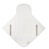 This image shows a white quilted baby bib with adjustable brown strap closures, designed in a t-shape and laid flat. the bib features a simple, clean design suitable for infants.