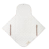 A Organic Cotton Portable Changing Mat - Blossom in an unfolded state, displayed on a white background. it features a quilted, pale beige fabric with visible snap fasteners and brown straps for secure closure by Makemake Organics.