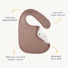 Illustration of a Makemake Organics organic muslin bib made from 100% organic cotton with adjustable snap closures and an absorbent terry back. the bib is displayed in a light brown color.