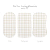 Three different shaped bassinet mattresses with a beige gingham pattern, labeled as oval, rectangle, and hourglass, fitting most standard bassinets up to 33 inches.