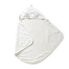 A Makemake Organics Organic Cotton Hooded Baby Towel & Poncho - Dotty, spread out on a white background.