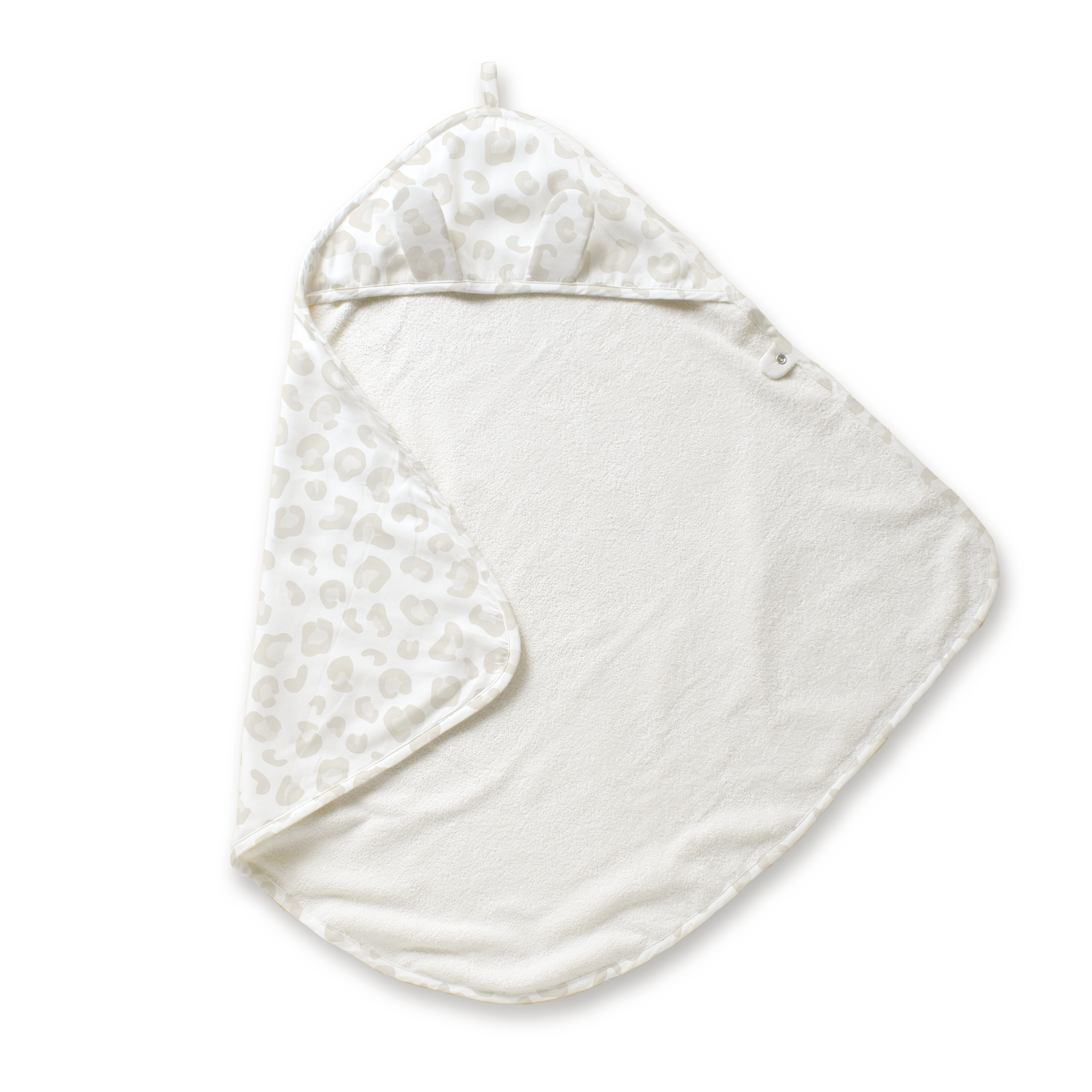 A soft, white Organic Cotton Hooded Baby Towel & Poncho - Wild with a pattern of grey hearts, draped and folded partially to show the hood, isolated on a white background by Makemake Organics.