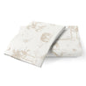 Two folded fabric pieces with a beige safari animal print featuring zebras, elephants, and tropical foliage on a white background. Product: Makemake Organics Organic Cotton Toddler Pillowcase - Safari.