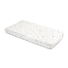 A rectangular baby mattress with a floral pattern in muted colors, isolated on a white background. Organic Cotton Changing Pad Cover - Bloom from Makemake Organics.