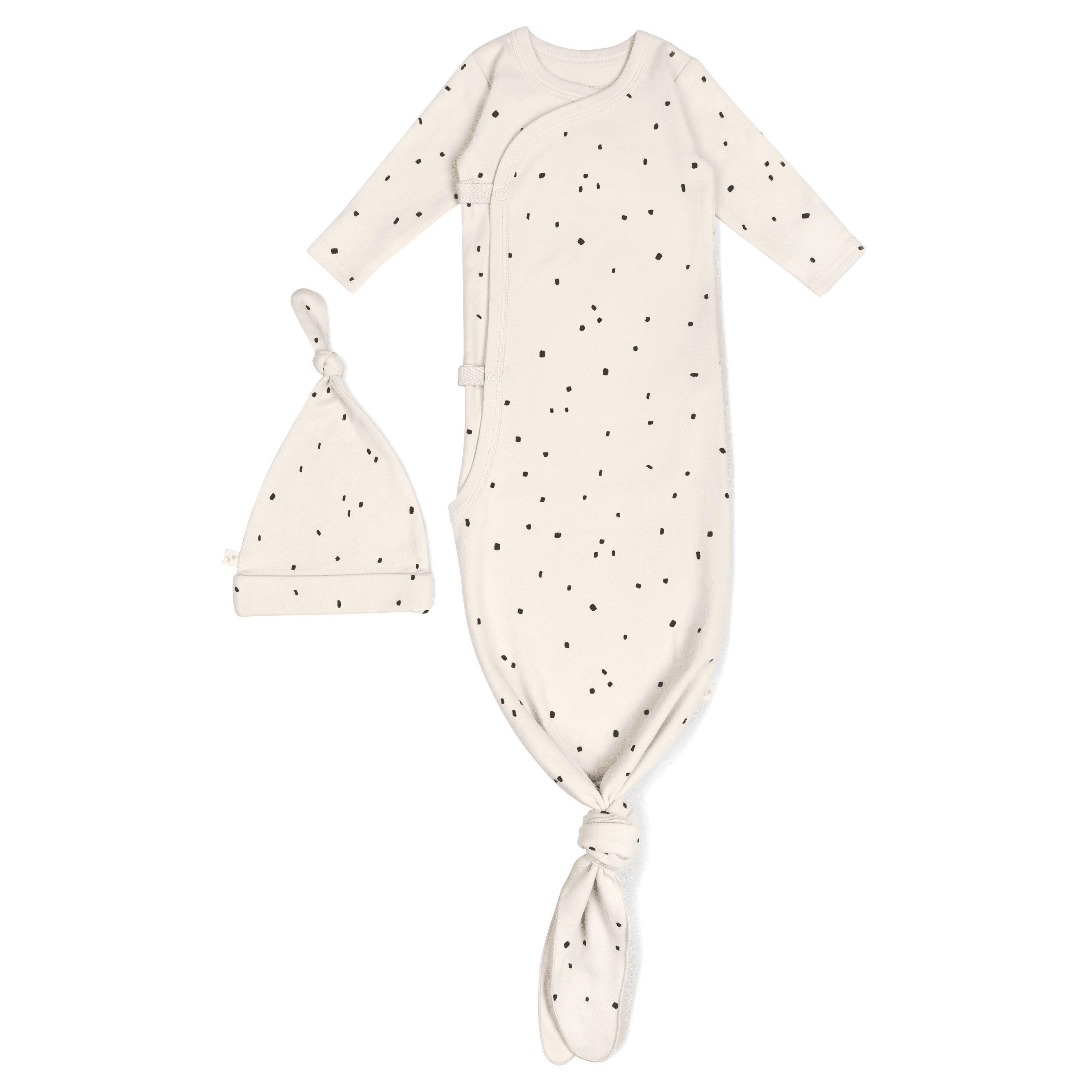 A cream-colored Organic Kimono Knotted Sleep Gown in Pixie Dots by Makemake Organics, featuring a knotted design at the bottom, paired with a matching hat, all isolated on a white background.