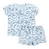 A light blue pajama set featuring a v-neck t-shirt and matching shorts with an all-over print of small dark blue feather motifs, laid flat on a white background. would be: 

Organic Tee and Shorts Set in Minnow by Makemake Organics.
