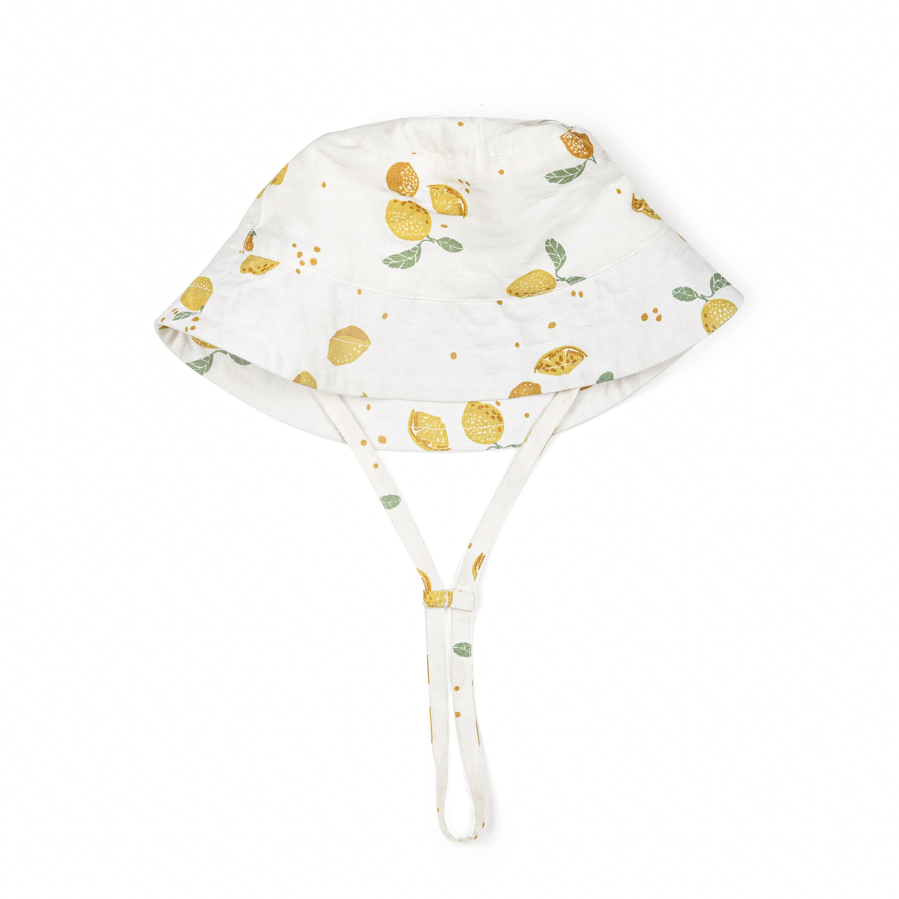 A white toddler sun hat adorned with a colorful lemon and leaves print, featuring a wide brim and two chin straps, isolated on a white background. The Organic Linen Bucket Sun Hat - Citron by Makemake Organics.