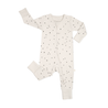 A cream-colored toddler romper with black polka dots laid flat on a white background. The Organic 2-Way Zip Romper - Pixie Dots from Makemake Organics has long sleeves and snap closures from the neck down to the left ankle.