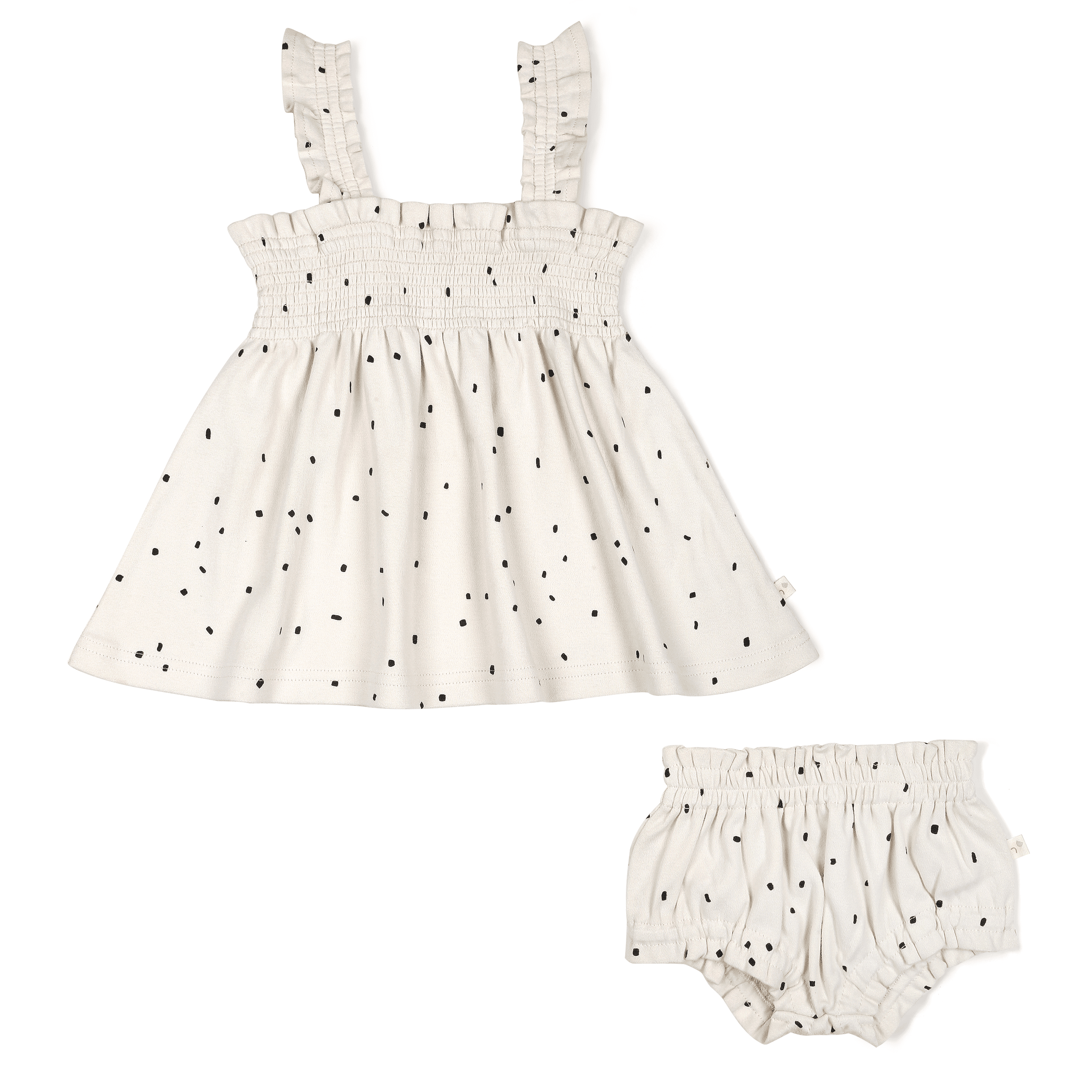 A cream-colored baby's Organic Smocked Dress - Pixie Dots with a smocked bodice and black polka dots, accompanied by matching bloomers, displayed on a white background from Makemake Organics.