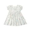 A toddler's Organic Puff Sleeve Dress in Wild Safari print from Organic Kids, neatly displayed isolated on a white background.