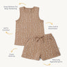 Image of a beige Organic Tee & Shorts - Strokes for toddlers with small white symbols printed on them from Organic Kids. Features include snap buttons, GOTS certified fabric, stretchy material, and