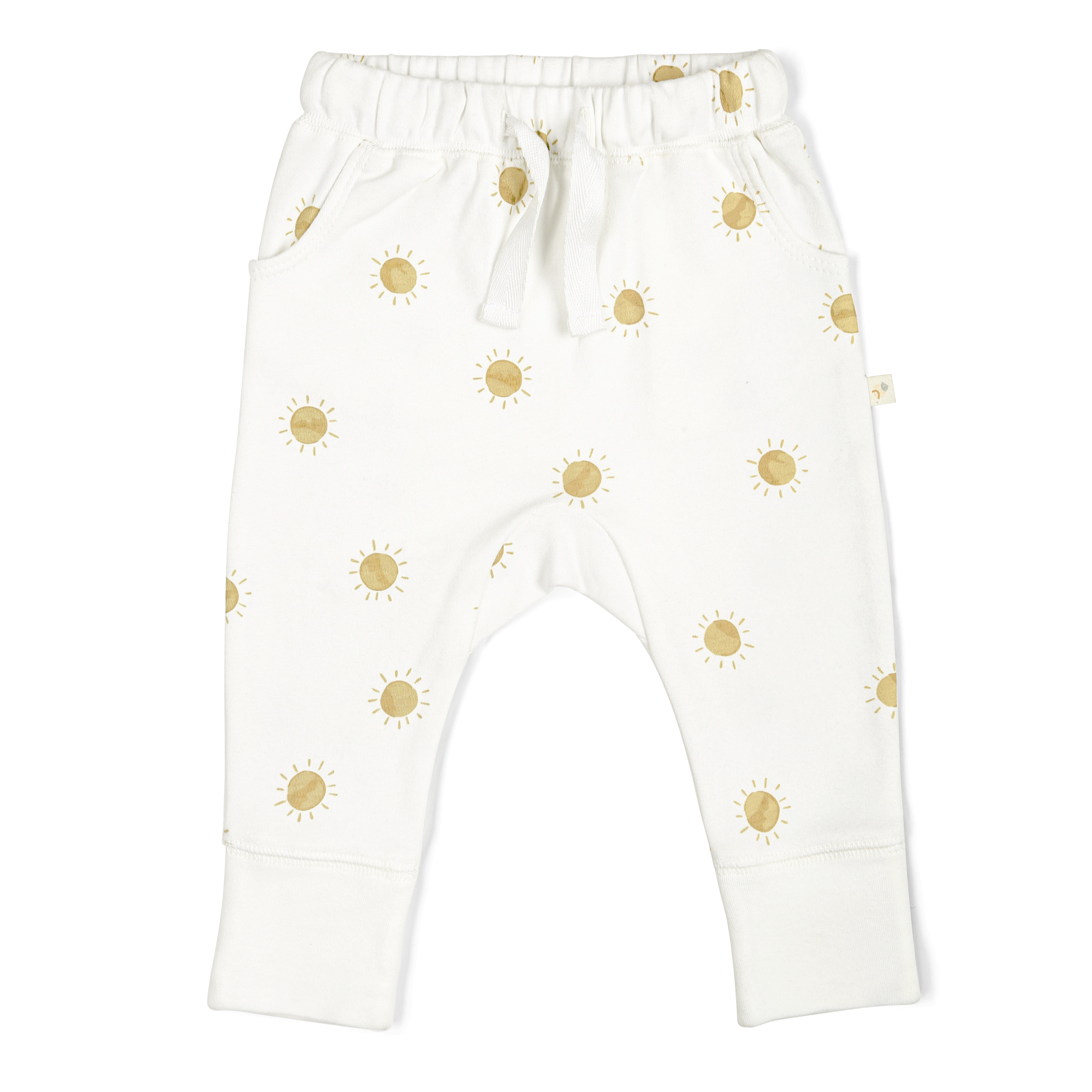 White toddler Organic Harem Pants - Sunshine with a pattern of golden suns, featuring a drawstring waist and cuffed ankles, displayed on a plain background by Makemake Organics.