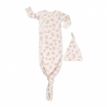 A toddler's Organic Kimono Knotted Sleep Gown in Seashells from Makemake Organics, complete with a knot at the bottom and matching beanie in a light color, adorned with a delicate floral print, displayed on a white background.