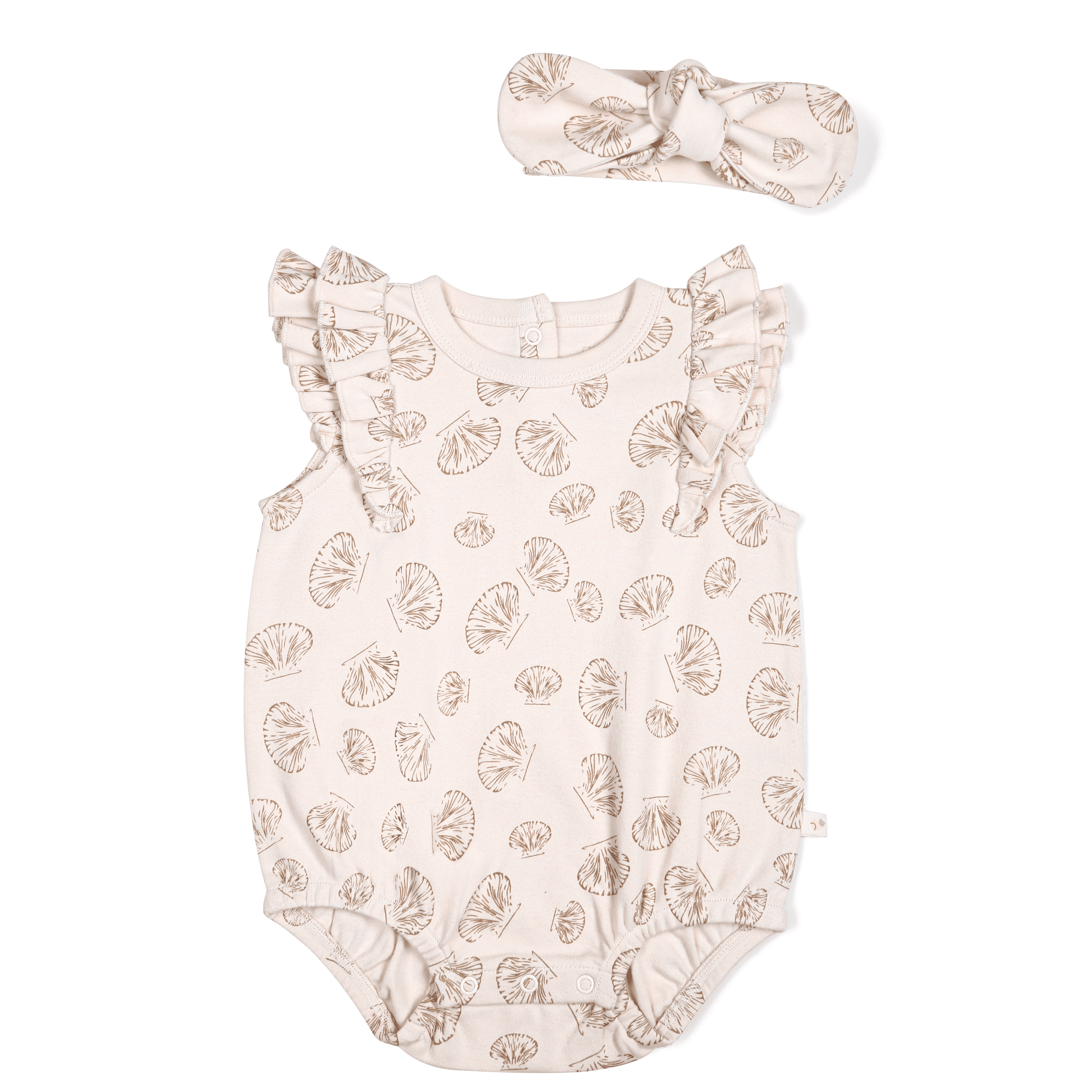 A toddler's Organic Flutter Bubble Onesie in Seashells by Makemake Organics with a leaf pattern and matching shoes, displayed on a white background. The onesie features ruffled sleeves.