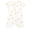 A toddler's white Organic Short Zip Romper - Sunshine from Makemake Organics, featuring a pattern of golden suns, short sleeves, a rounded neckline, and a zipper closure running diagonally from the neckline to the left leg.