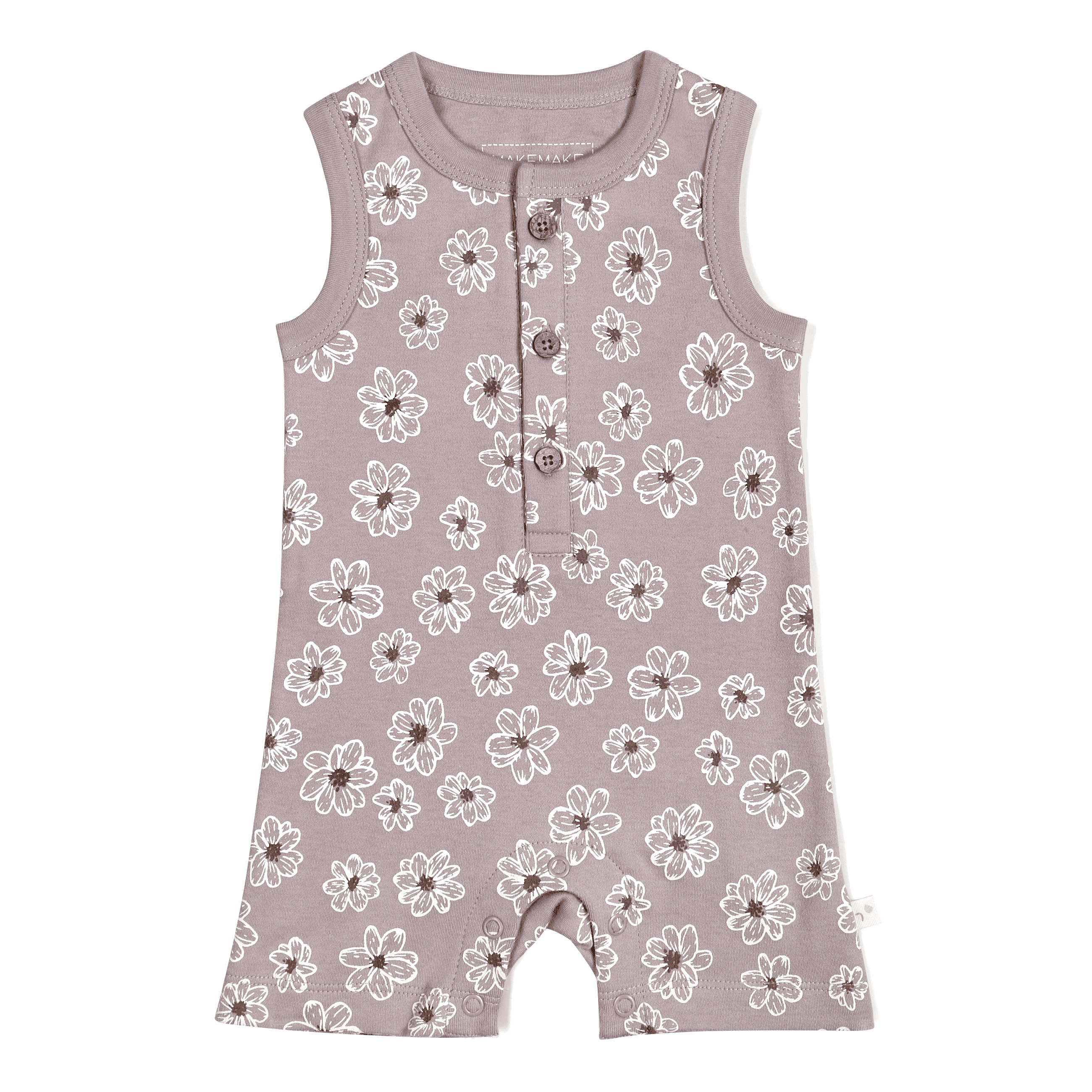 A sleeveless toddler romper in a dusty pink color with an all-over white floral print, featuring snap closures at the front and along the inseam for easy dressing, such as the Organic Sleeveless Short Romper - Daisies by Makemake Organics.