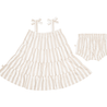 A toddler girl's clothing set featuring an Organic Linen Tiered Strap Dress in Beige Stripes, matching bloomers, and bow-tie hair clips, all presented in a neutral color palette on a white background by Makemake Organics.