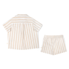 A Makemake Organics beige and white striped toddler's outfit consisting of a short-sleeved button-up shirt with a collar and matching elastic-waisted shorts, displayed on a white background.