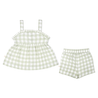 A green and white Organic Muslin Peplum Top and Shorts Set in gingham print from Makemake Organics, set against a white background featuring a sleeveless top with ruffle details and matching shorts.