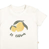 Organic Crew Neck Tee - Le Citron with an illustration of two yellow lemons and the phrase "le citron" printed in black text. The shirt features a small snap button on the shoulder by Makemake Organics.
