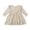 A Organic Girls beige floral-printed baby dress with long sleeves and a ribbed collar, laid flat on a white background.