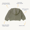 An image showing a flat-laid green Organic Hooded Jacket - Olive from Organic Baby with a generous size for growth. The hoodie features a large hood, elastic cuffs, and is made of 100% organic cotton.