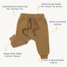 Image of a pair of toddler tan-colored joggers from Organic Baby with an elastic waistband and drawstring, labeled as GOTS certified cotton, soft, breathable fabric, and generously sized