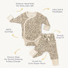 Flat lay of a baby's leopard print outfit from Makemake Organics, including a Organic Baby GOTS certified Kimono Onesie & Pants Set - Spotted with foldover hand mitts and pants with a gusset for extra diaper room.
