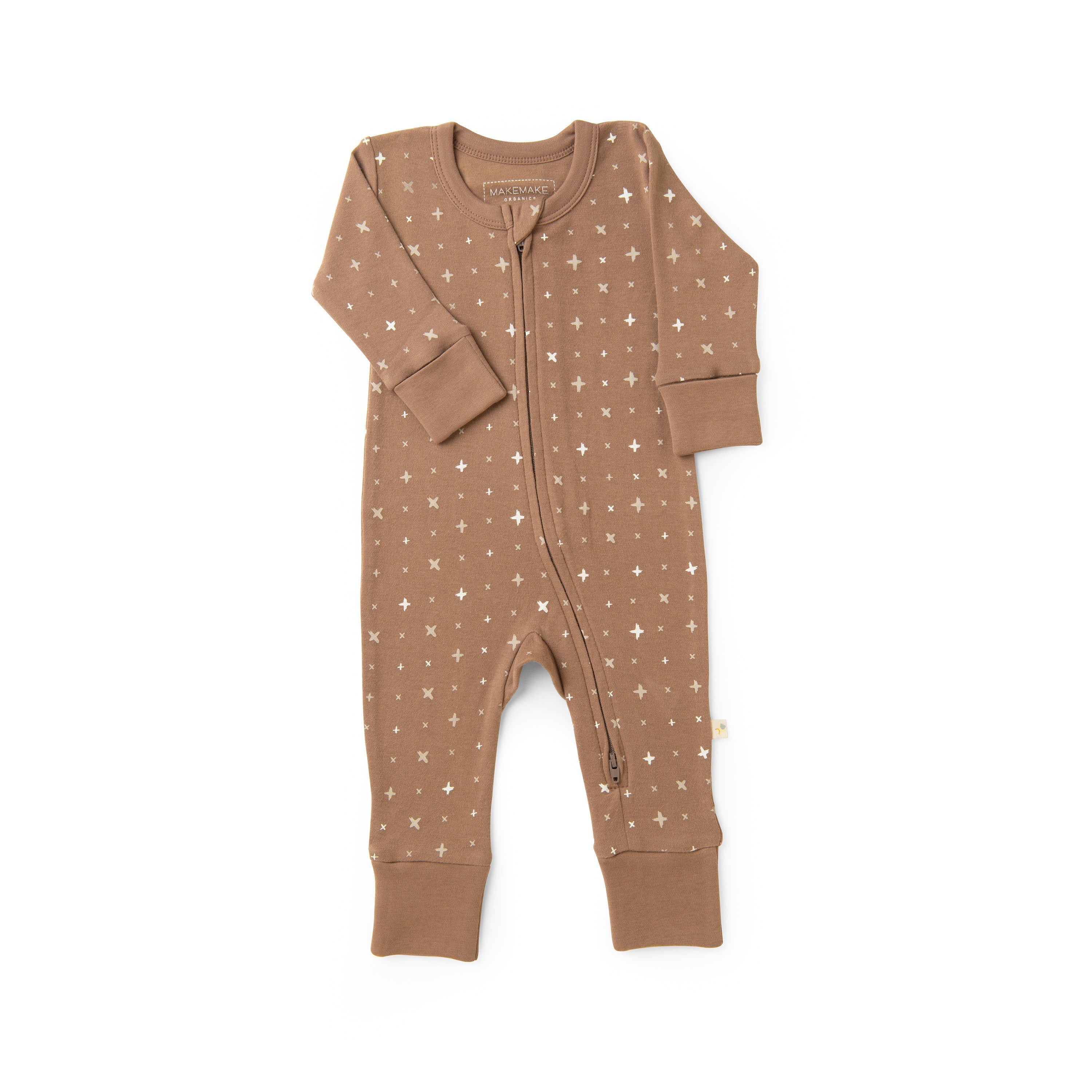 A brown baby Organic 2-Way Zip Romper - Sparkle with a white stars and crosses pattern laid flat on a white background. the garment features full sleeves and legs with a central zipper for easy dressing. (Brand Name: Organic Baby)