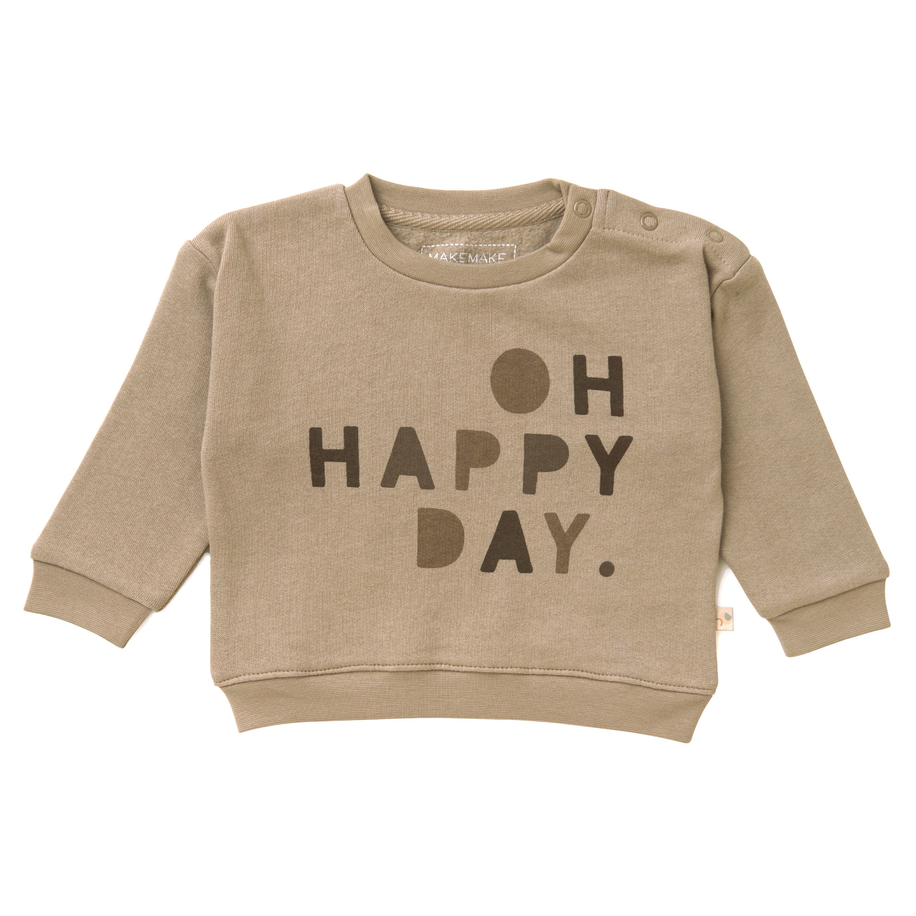 A beige Organic Baby sweatshirt from Makemake Organics with the phrase "oh happy day." in bold, dark letters across the chest, featuring a buttoned shoulder for easy dressing.