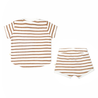 A Makemake Organics Organic Tee and Shorties Set - Stripes consisting of a short-sleeved t-shirt and matching shorts in white and tan colors, displayed on a white background.