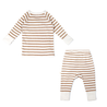 A striped toddler outfit with a long-sleeved shirt and matching pants in white and muted orange, neatly arranged and displayed on a white background. The Organic Kimono Top & Pants Set - Stripes by Makemake Organics.