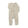 A beige Organic Baby 2-Way Zip Romper in the Camplife design, decorated with a pattern of small brown tents, trees, and campfires, displayed on a white background.