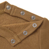 Close-up of a brown Organic Baby Organic Graphic Sweatshirt - Play collar with silver snap buttons, displaying texture and stitching details on a white background.